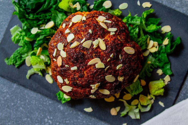 Step 1.2: Serve the roasted cauliflower with flaked almonds and lettuce leaves if desired