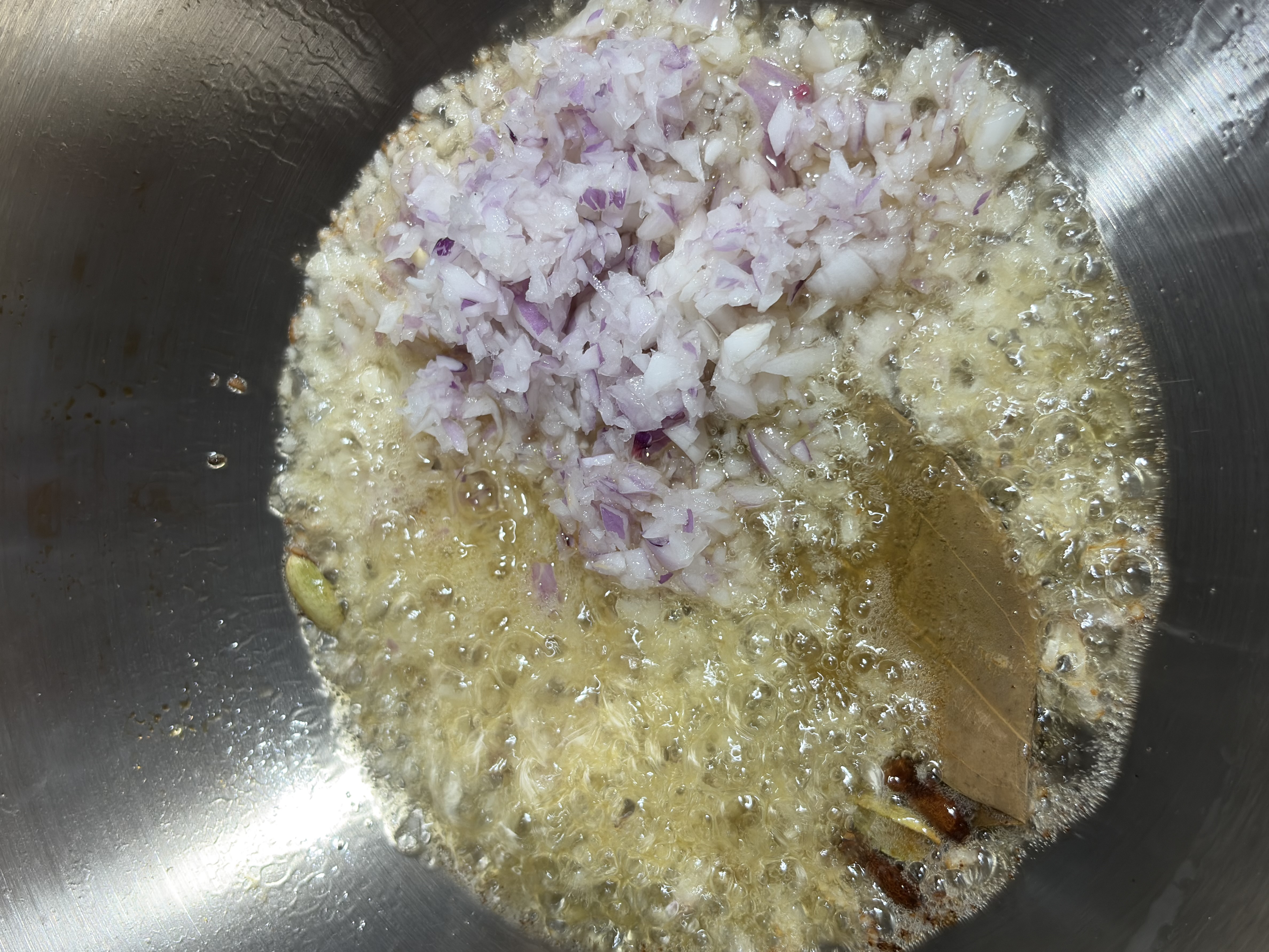 Step 4.1: Add the chopped onions and sauté until light golden