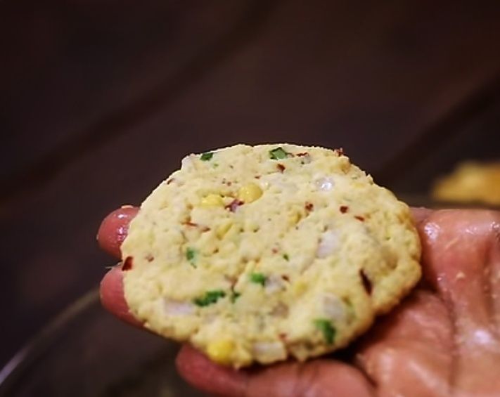 Step 4.3: Take a small portion from the batter, roll it with your hand, and gently flatten it with your palm (not too thick)