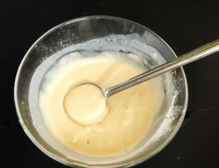 Step 1.2: Add flour and baking powder to the bowl and mix until combined