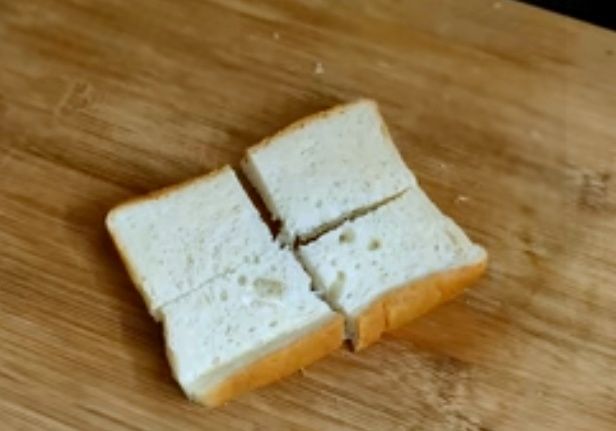 Step 1.1: Cut the bread slices into 4 pieces