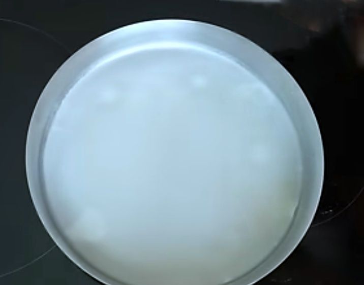 Step 1.1: Steam the plate until the batter turns translucent