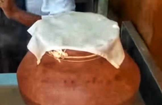 Step 4.2: For the traditional method, take a clay pot or steamer and line the inside with a clean white cloth