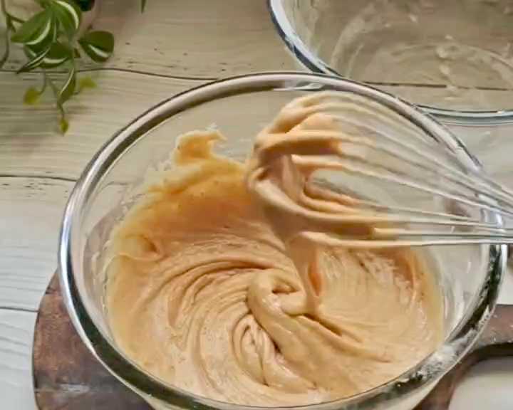 Step 3.1: Add yogurt, hot water, and vanilla extract to the oil mixture and mix again