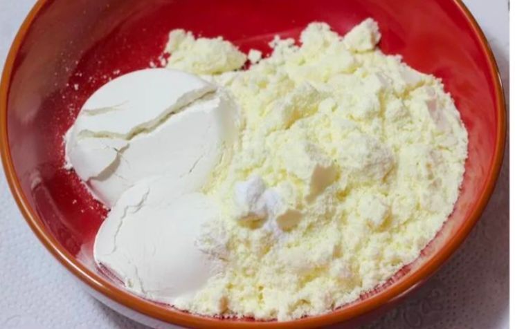 Step 1.1: In a large bowl, mix milk powder, maida, and baking powder