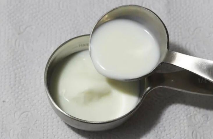 Step 1.1: Add milk as required and combine to form a soft dough