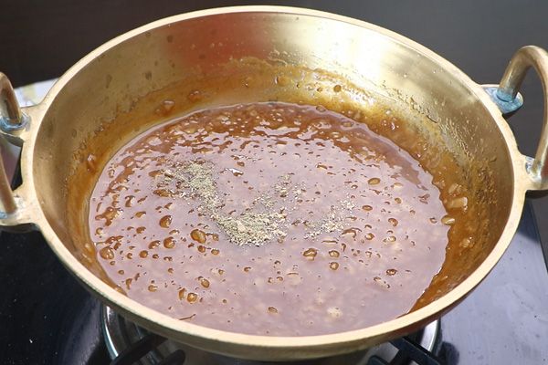 Step 2.1: Add dry ginger powder and cardamom powder