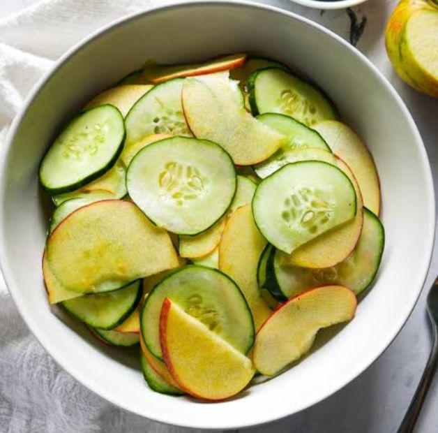 Step 1.1: Peel and chop the cucumber and apple into small pieces