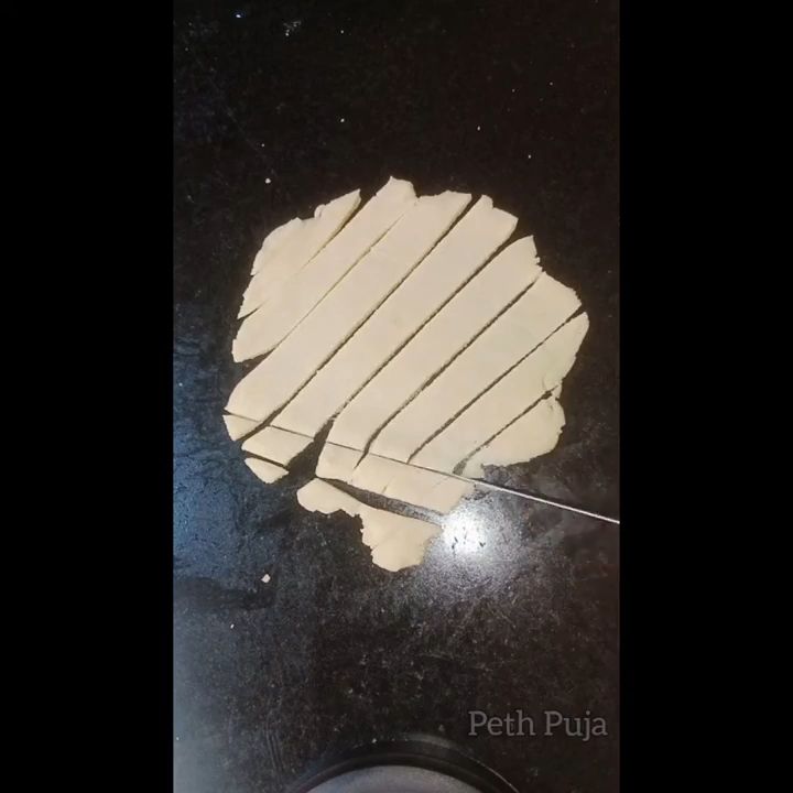 Step 1.2: Roll the dough into half-inch thick paratha-like sheets and cut into square shapes