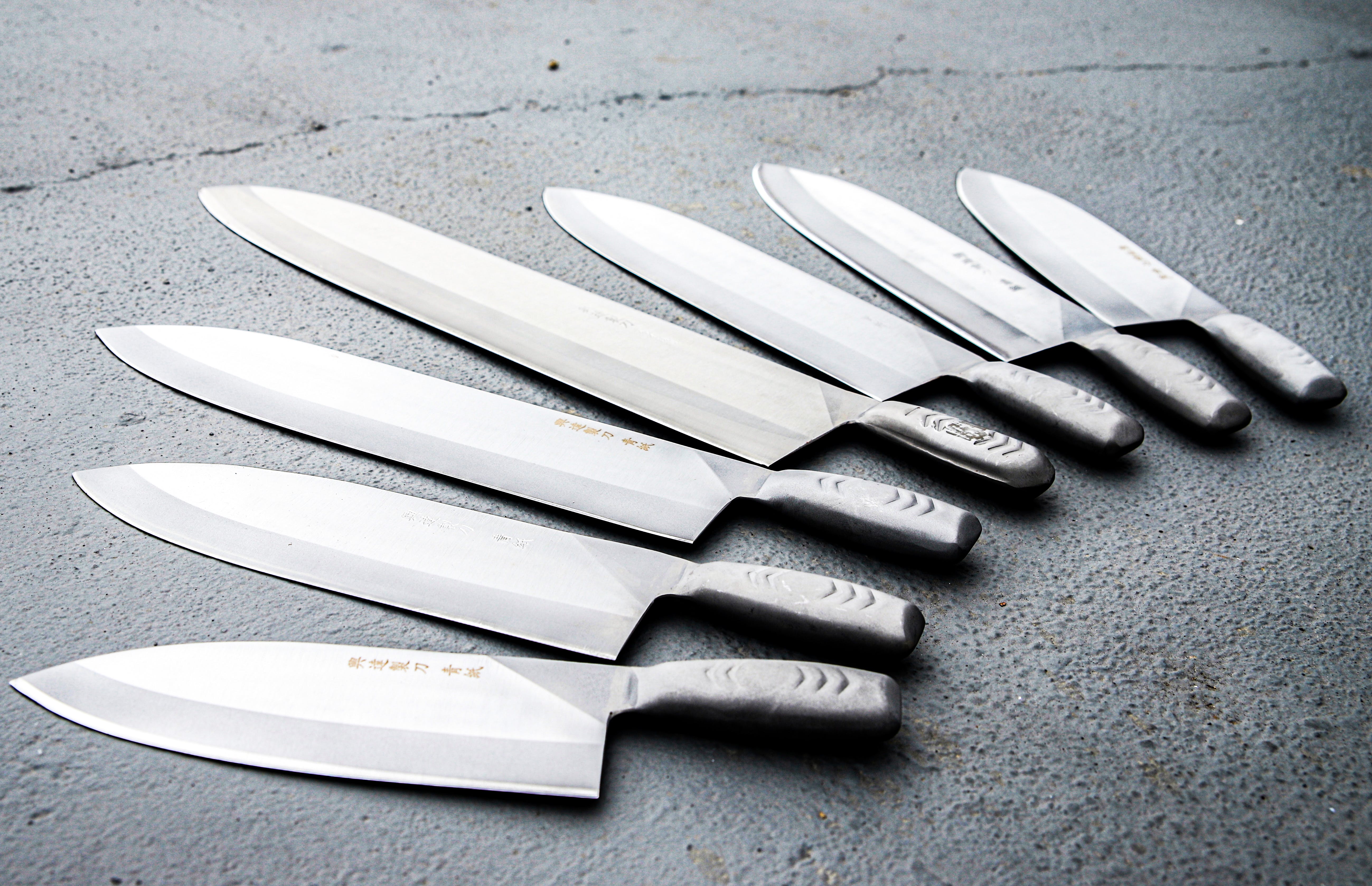 A variety of knives laid out