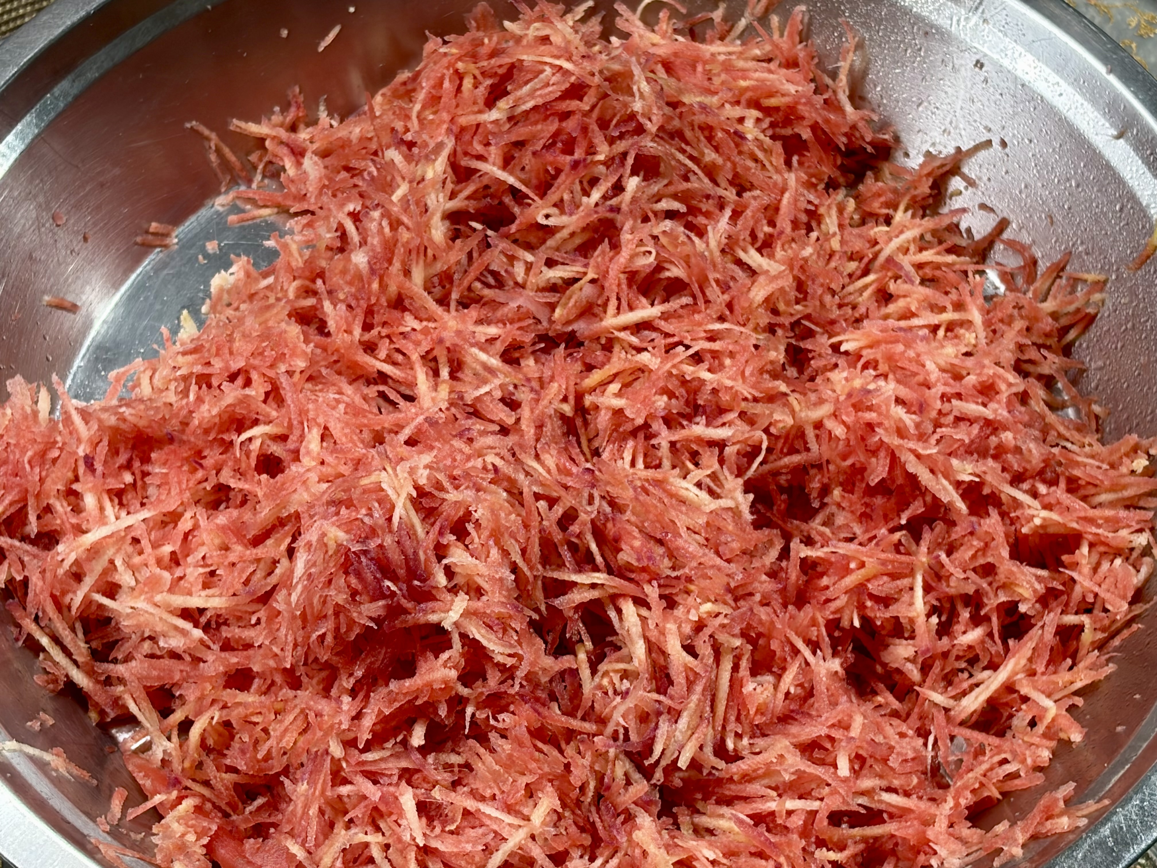Step 1.1: Wash, peel, and grate the carrots using a medium grater