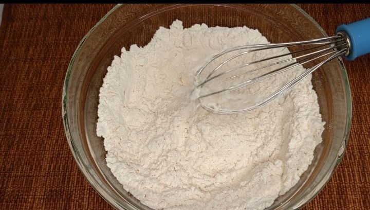 Step 1.2: Add 2 pinch of salt into the bowl and mix well