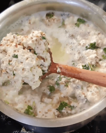 Step 1.1: Add vinegar and the spice mix to the boiling milk and stir until the milk curdles