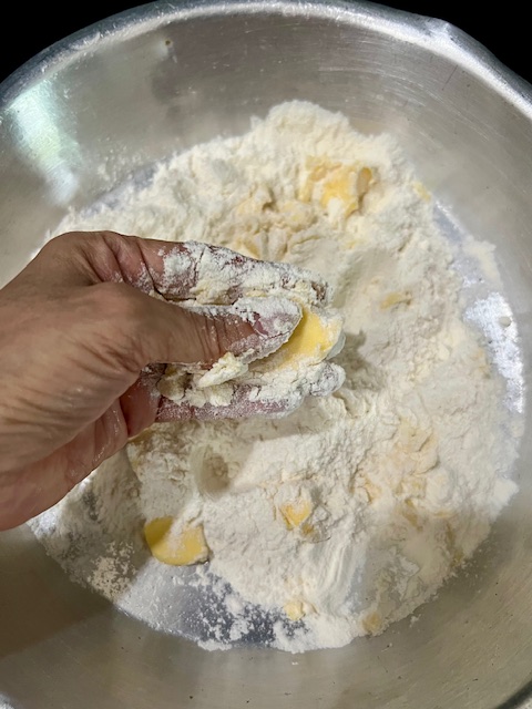 Step 1.1: In a bowl, mix flour and cold butter