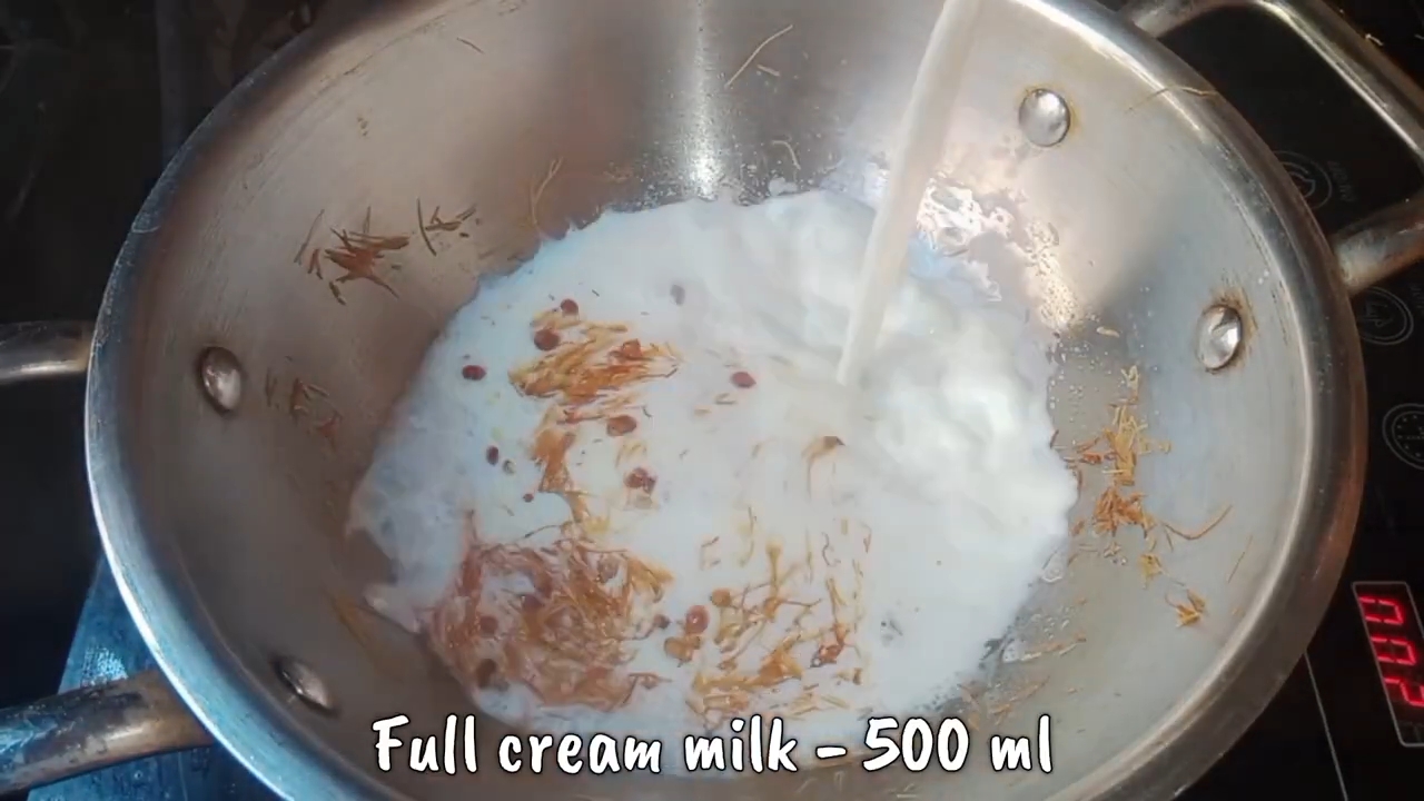 Step 1.1: Pour in the full cream milk and bring it to a boil
