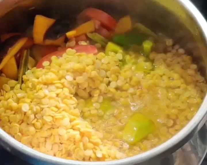 Step 2.1: Add soaked arhar dal and water