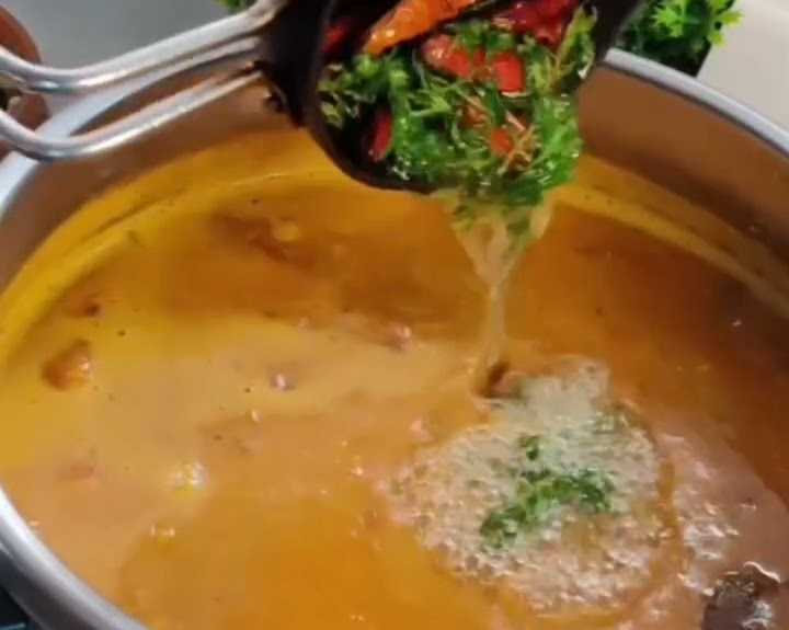 Step 3.1: Pour the tempering over the cooked Sambhar