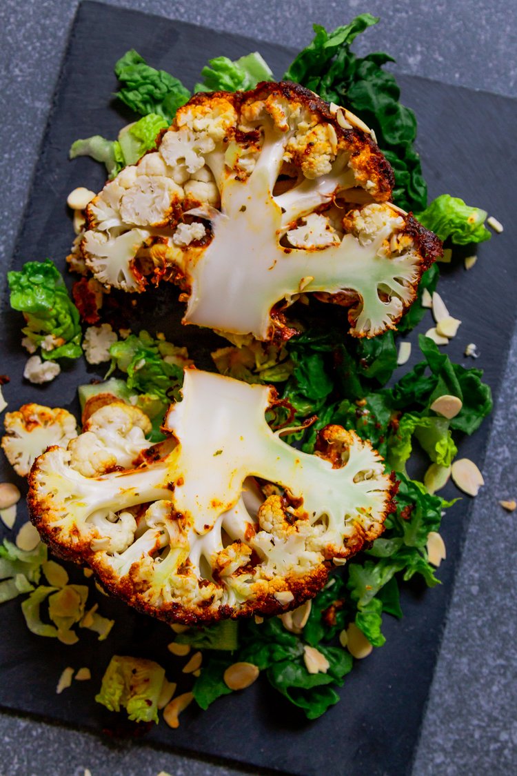 Step 1.1: Serve the roasted cauliflower with flaked almonds and lettuce leaves if desired