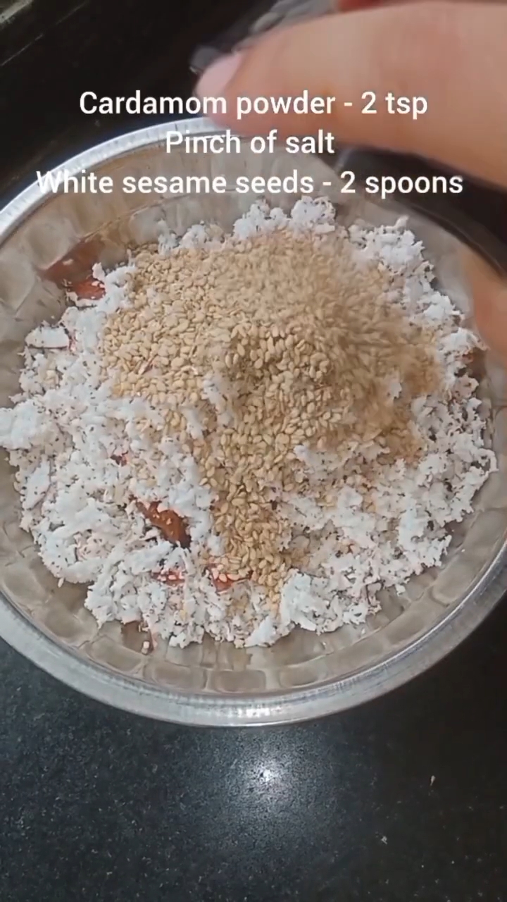 Step 2.1: Mix jaggery, shredded coconut, green cardamom powder, sesame seeds, and a pinch of salt in a bowl