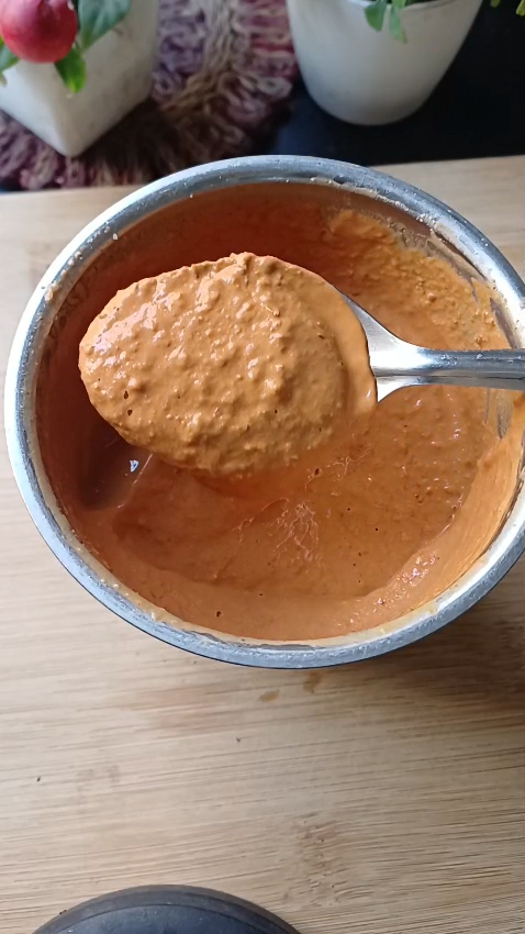 Step 1.2: In a mixie jar, blend soaked rice, lashmiri dry red chillies, tamarind, rock salt, and turmeric powder into a fine paste