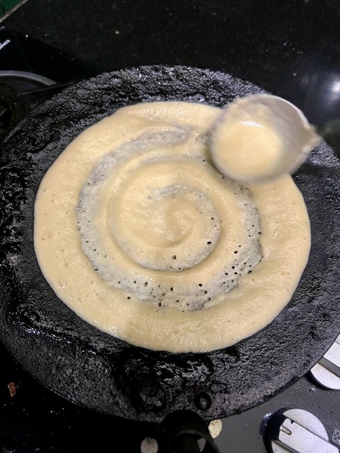 Step 3.1: Spread gently in circular motions, like a dosa