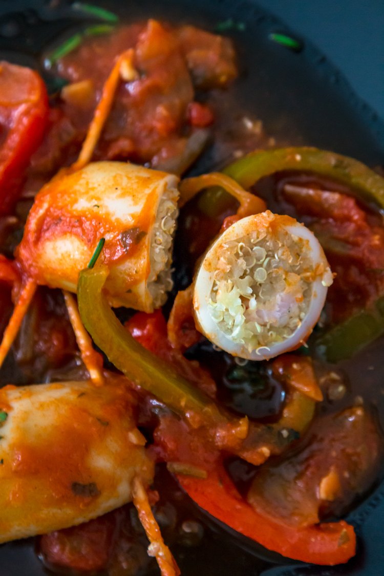Step 2.1: Place the stuffed squids in the tomato and bell pepper tagine over medium heat