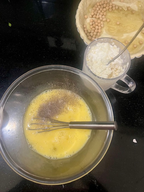 Step 2.1: In a bowl, whisk eggs and mix in cream