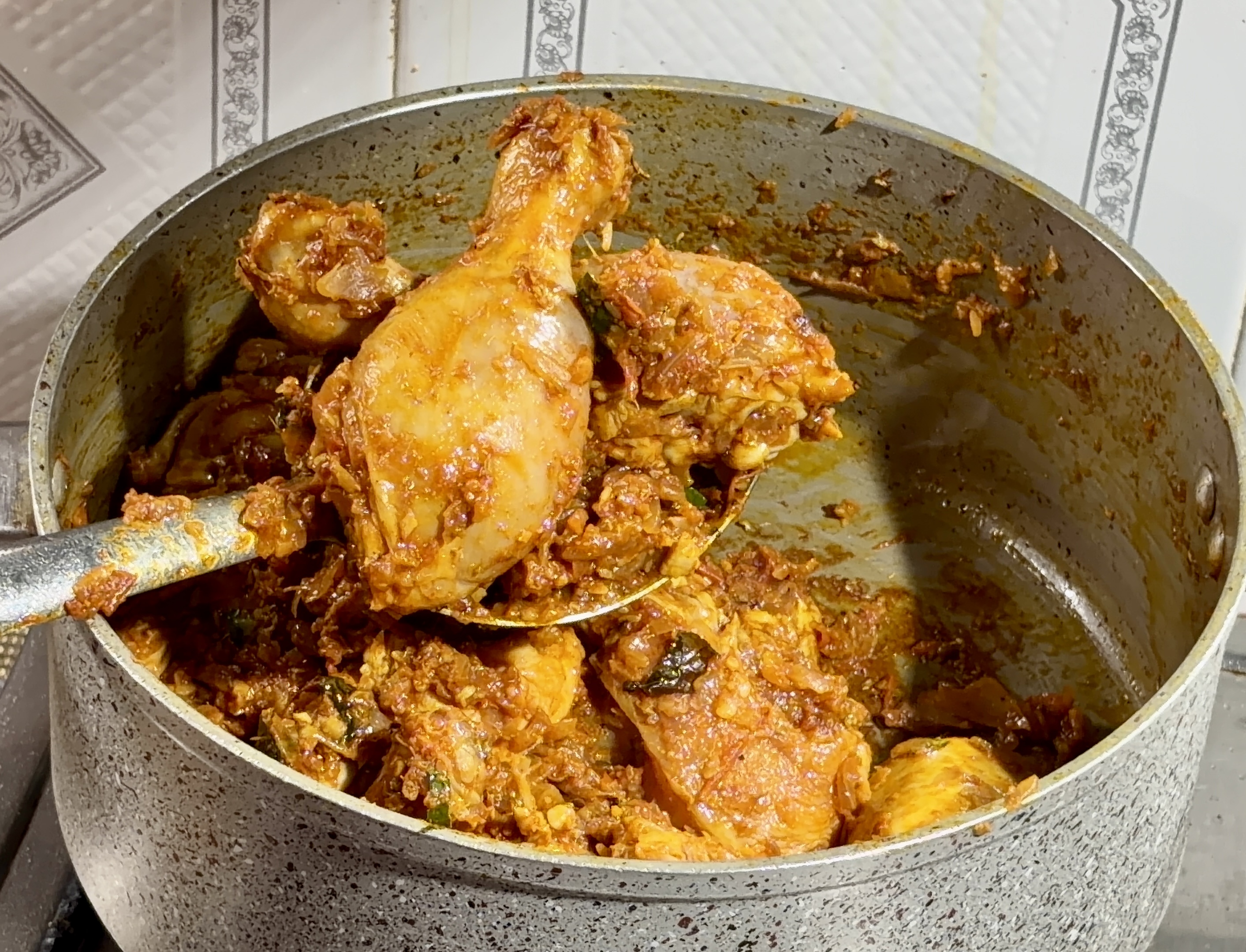 Step 2.2: Add the marinated chicken and cook on high heat, stirring, until the chicken changes color and gets well coated