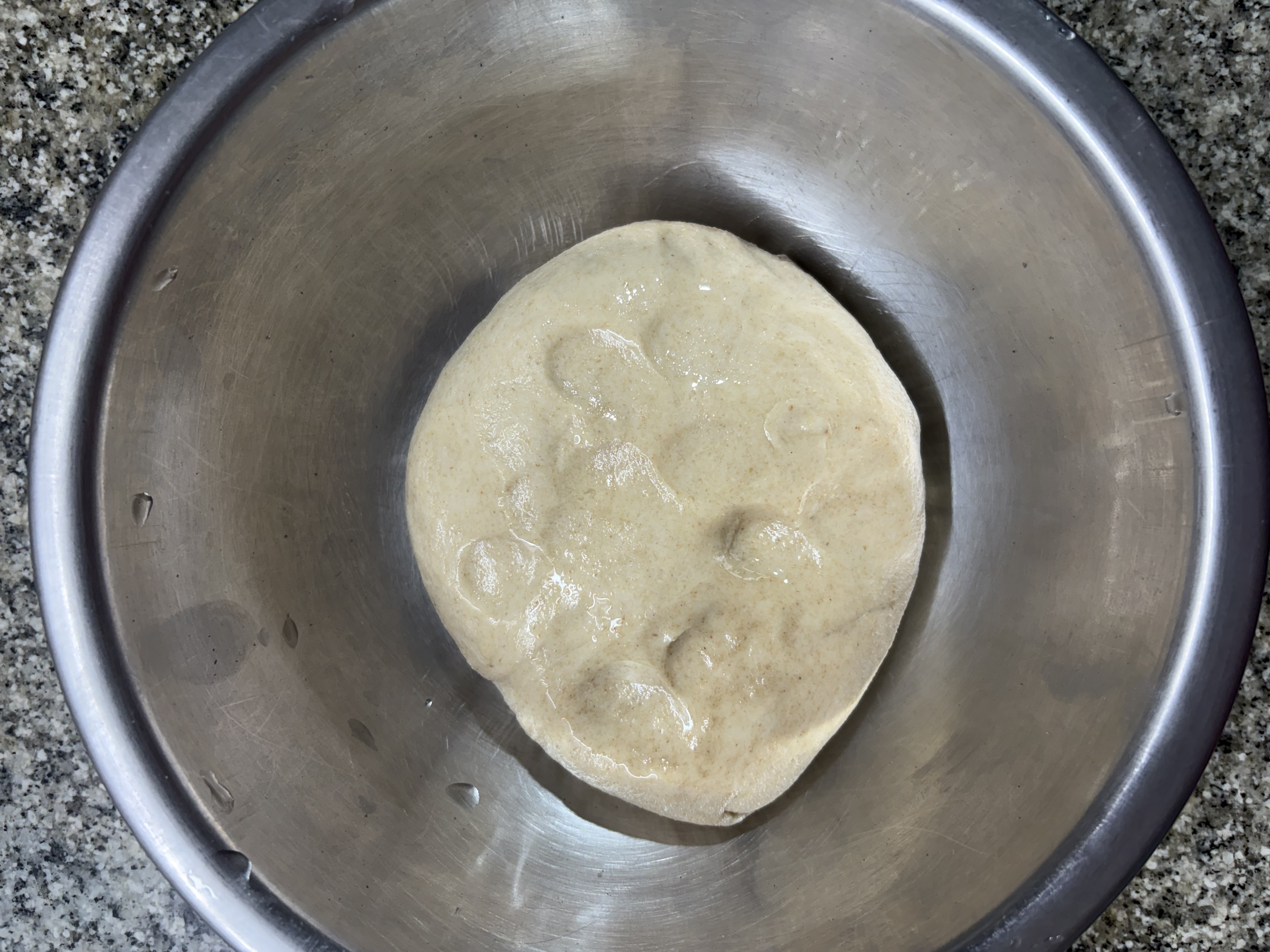 Step 2.1: Lightly grease the surface with oil, cover, and let it rest for 10-15 minutes