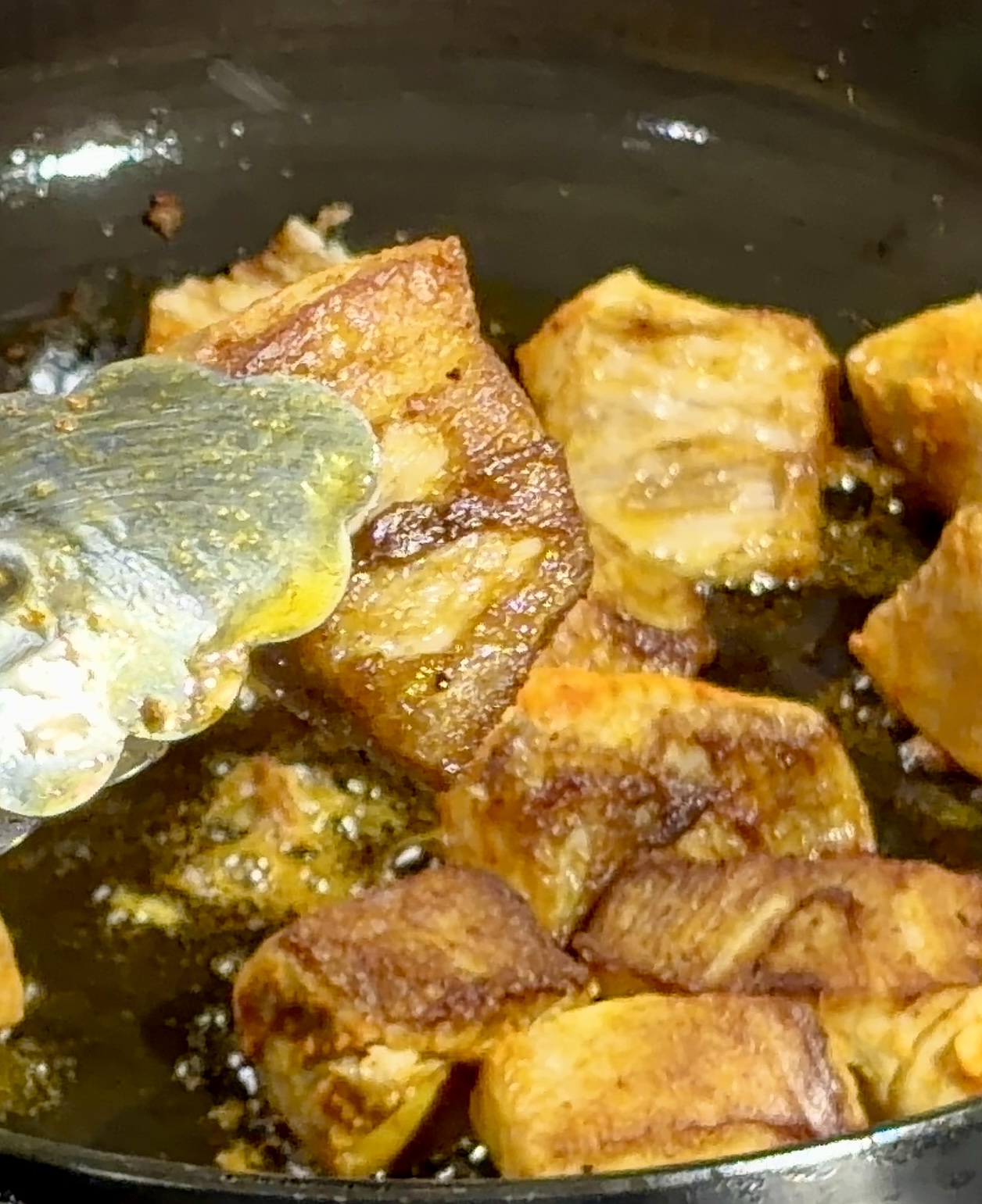 Step 2.2: Heat oil in a pan and shallow-fry the marinated fish in batches until lightly golden on both sides