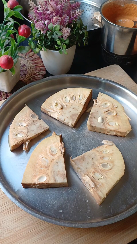 Step 1.1: Cut the raw jackfruit into triangular shapes