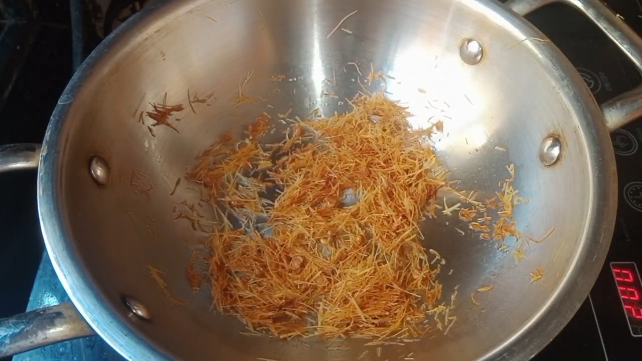 Step 1.2: Add charoli to the pan and roast it briefly with the sevaiya