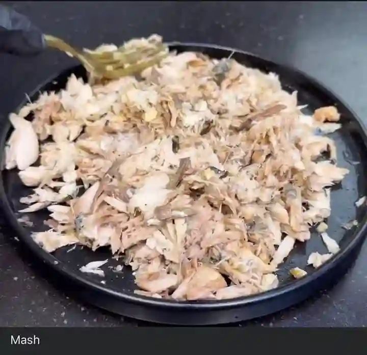 Step 1.1: Debone the fish and mash it