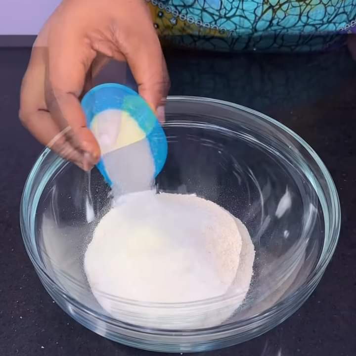 Step 1.1: Add milk and sugar to the garri