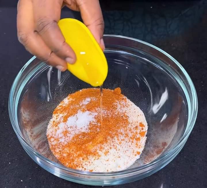 Step 1.2: Add suya pepper( you can go through my other recipes to find out how to make suya pepper) and add little vegetable oil