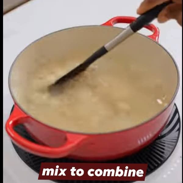 Step 1.1: Add the rice into the boiling water and mix well to combine