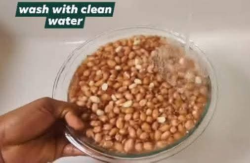 Step 1.1: Wash the raw peanuts thoroughly with clean water until they are clean