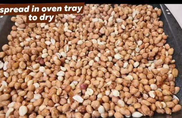 Step 1.1: Spread the peanuts on an oven tray to dry