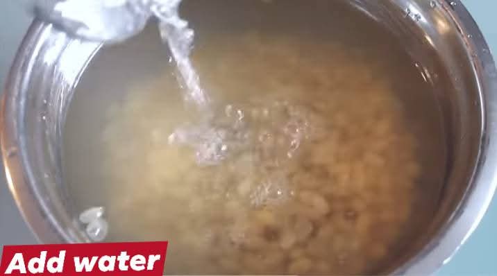 Step 1.1: Add water and remove the soya bean peels