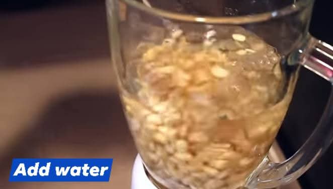 Step 1.2: Transfer the beans to a blender and add water