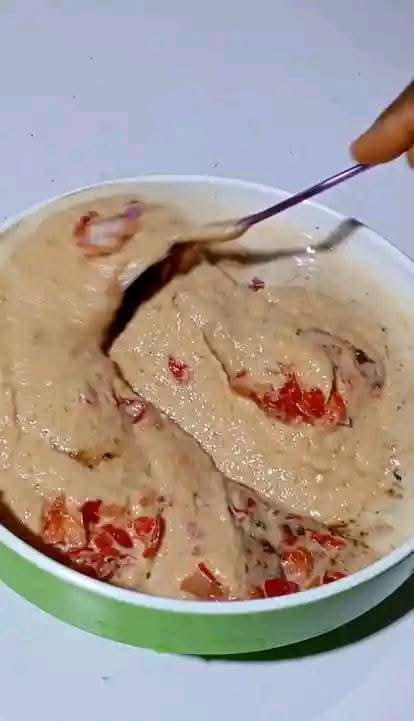 Step 1.2: Add coarsely ground onion and red peppers to the mixture and stir or whisk for 3-5 minutes