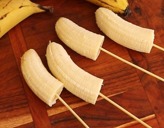 Step 1.2: Peel the bananas and slice each one in half