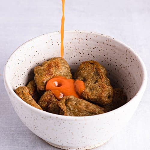 Step 3.1: Pour the buffalo sauce on top and toss until the wings are coated