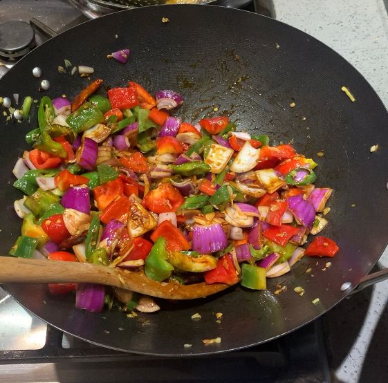 Step 3.2: Stir-fry the vegetables until they are slightly tender but still crispy