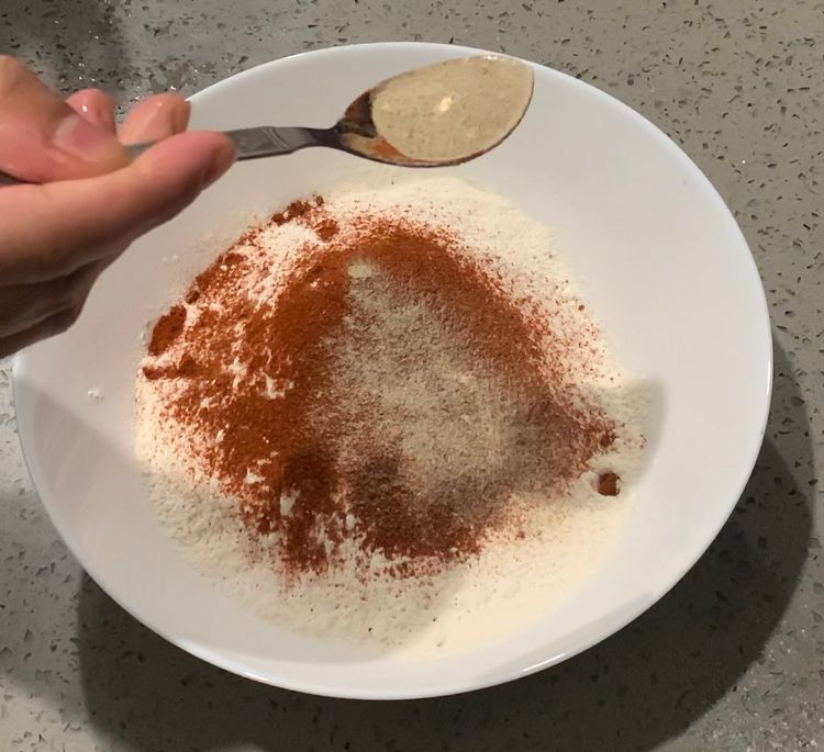 Step 2.1: Combine all-purpose flour, salt, paprika powder and white pepper powder in a flat bowl to make a flour mix