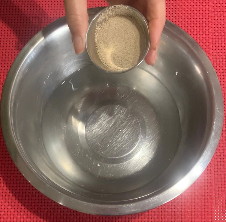 Step 1.1: In a small bowl, dissolve the dry yeast in warm water and let it sit for 5 minutes until it becomes frothy