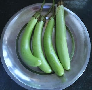 Step 1.1: Wash the brinjal and cut into medium pieces