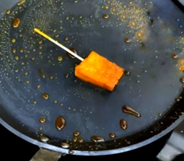 Step 1.1: Place the bread pieces over the caramelized sugar and evenly coat them