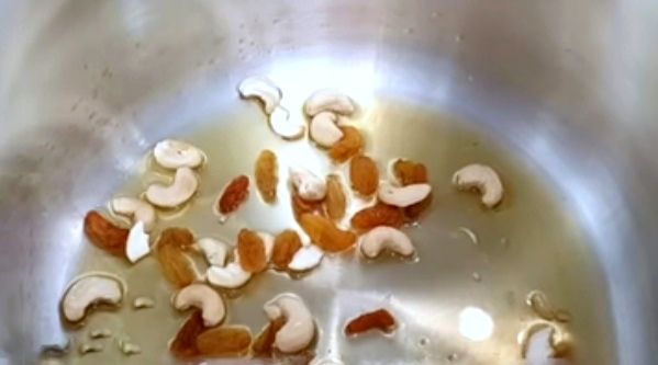 Step 1.1: Add cashew nuts and raisins, and sauté until the cashew nuts turn light brown