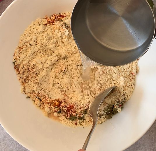 Step 2.2: Mix gram flour, rice flour (if using), carom seeds, dried fenugreek leaves, baking soda (add just before frying), and salt